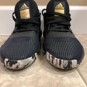 10.5 Mens Adidas black, gold and white low top basketball shoes like new